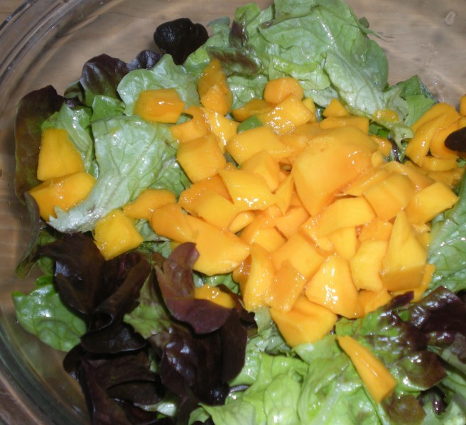 Tropical Salads, copyright 2010, gfcelebration.com, All rights reserved Tropical Salads - Prepared Greens and Cubed Mangoes