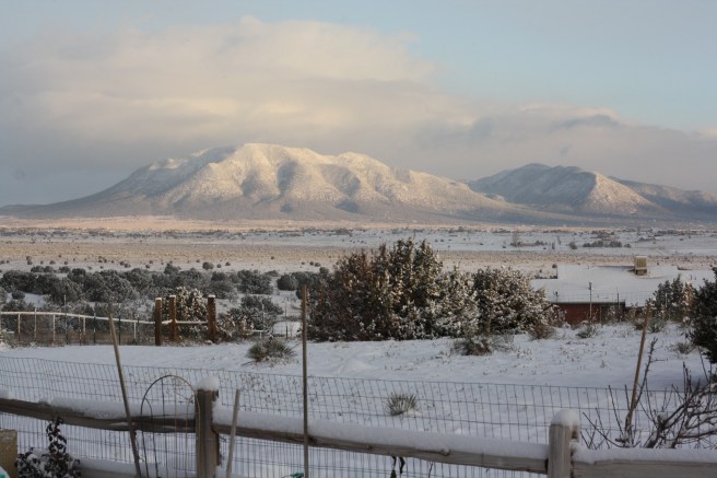 Pueblo Gingerbread House - Snow-covered mountains in New Mexico